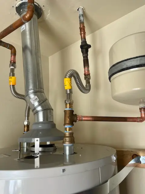 Water heater installation and plumbing repair in The Claremont Club